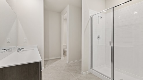 X40N floorplan primary bedroom ensuite rendering at Stonewyck Farms in Ennis TX