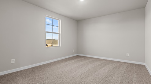 Upstairs guest bedroom 2 at the front of the home