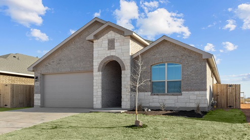 Single story classic brick home with front entry