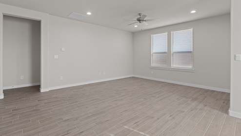 Open living and family room area with ample natural light