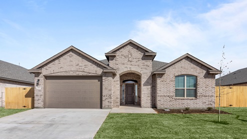 Exterior of single story modern brick style home