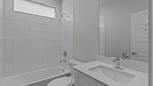 Half bathroom with shower and vanity