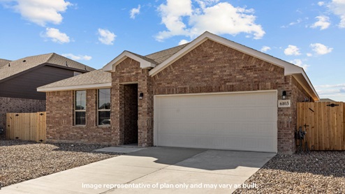 Side view of single story timeless brick home