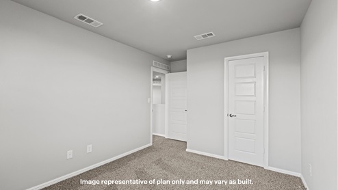 Upstairs guest bedroom 4 with plush carpet floors and side window