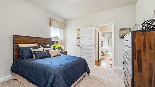 The Mila guest bedroom in River Hills.