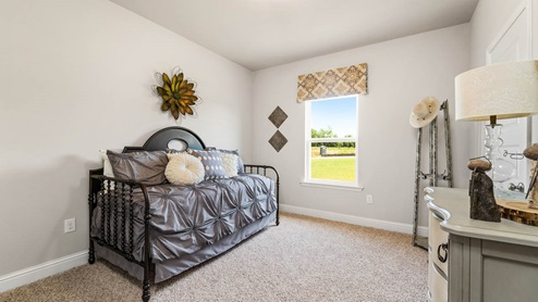 The Mila guest bedroom in River Hills.