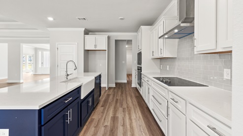 Two-toned kitchen new home in MS