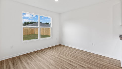 Naturally lit up dining area aside of kitchen