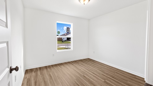 Bright and airy bedroom inside the Alston
