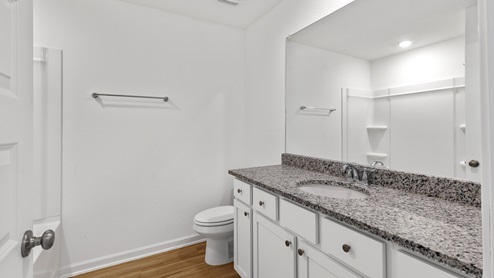Sleek bathroom inside hallway