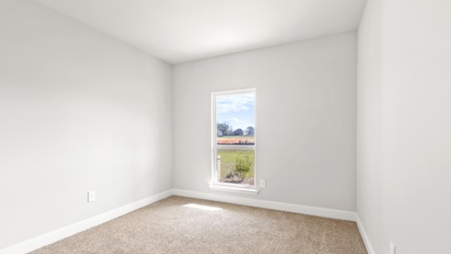 Bright and airy bedroom inside the Avery