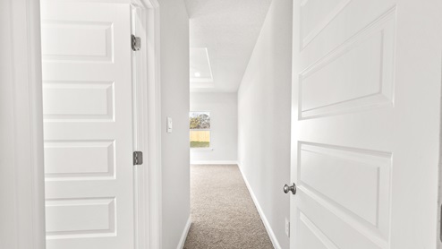Hallway entering the primary suite