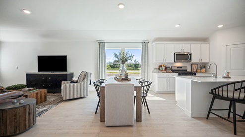 Open concept dining area and kitchen.