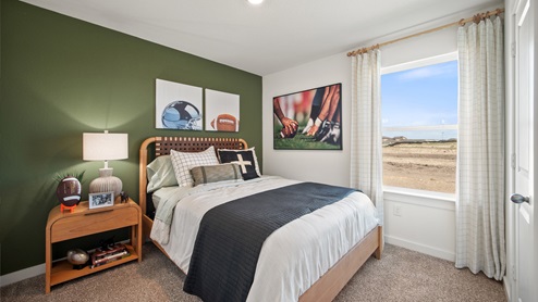Bedroom 3 with carpeted flooring.
