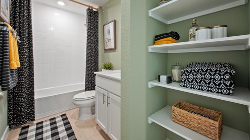 Secondary bathroom with shower and bathtub.