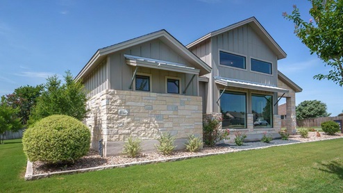 Schwertner Ranch Model Sales Office Front Exterior View of Front Door and Windows.