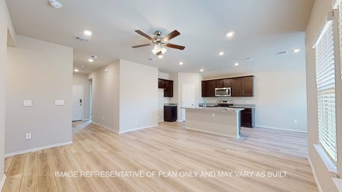 Bellvue entry with view into kitchen and living areas.