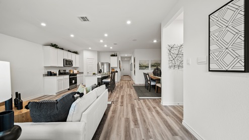 China Grove model home view from living room into kitchen.