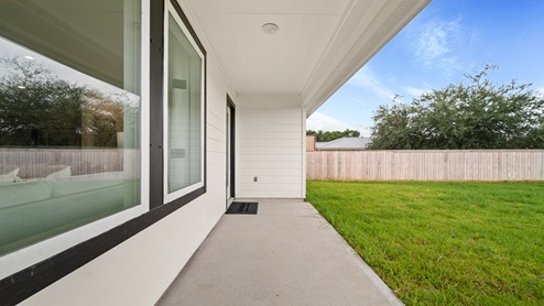 China Grove model home back patio and view of backyard.