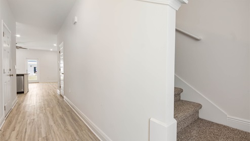 Main level entry hall leading to living area