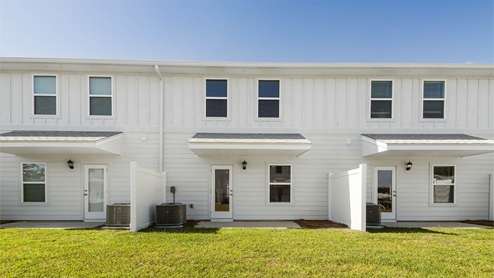 Exterior rear view of townhomes