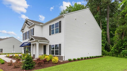 Two story home with white exterior