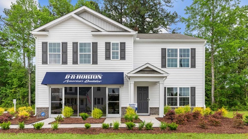 Two story home with white exterior