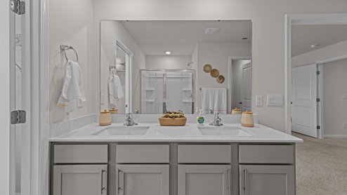 Primary bathroom with quartz countertops