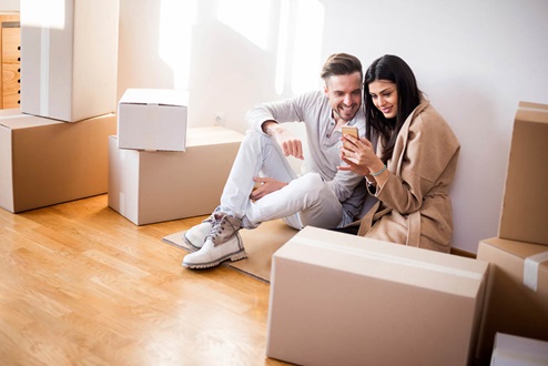 Couple moving into new home