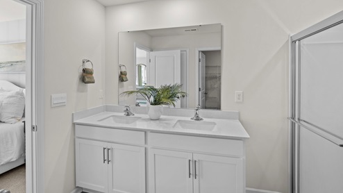 bathroom with quartz counters