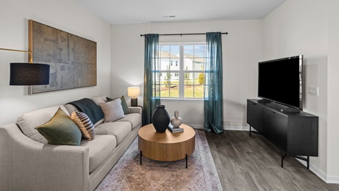 living room with revwood flooring
