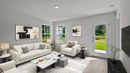 living room with ample lighting