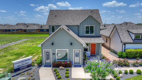 Nicole floorplan F elevation with farmhouse exteriors.