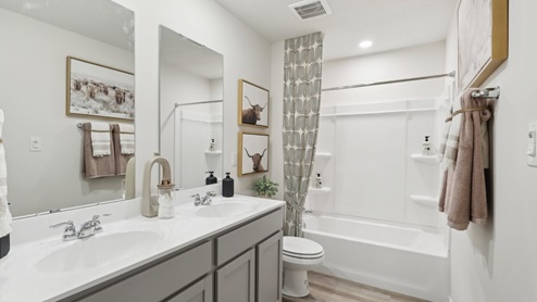 Secondary full bath with double vanity