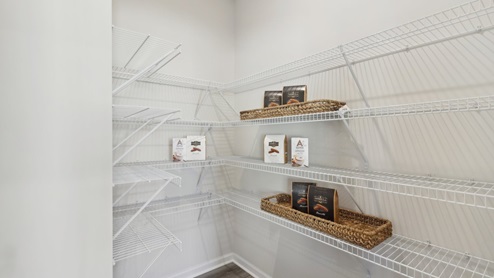 Corner kitchen pantry with coated wire shelving
