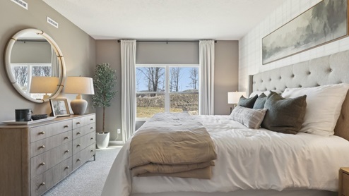 Primary suite with two large windows