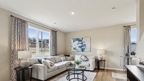 Main level living area with large windows
