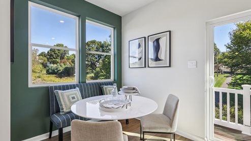 breakfast nook off of kitchen with window