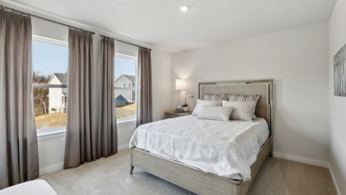 main level bonus room with large windows