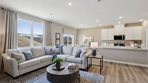 Living area open to dining and kitchen space