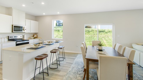 kitchen and dining area with sliding glass door
