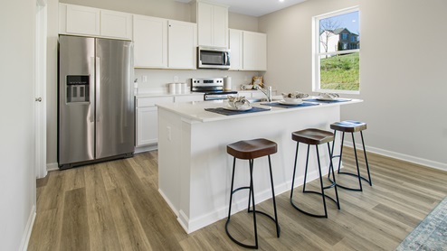 kitchen with shite cabinets and countertops