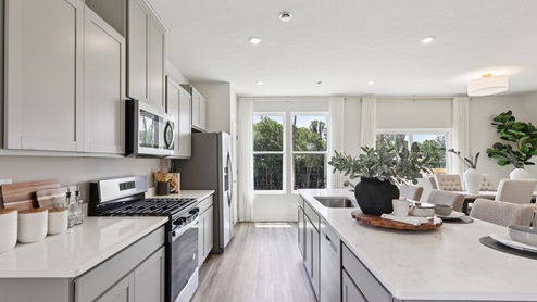 Regent kitchen area with white countertops
