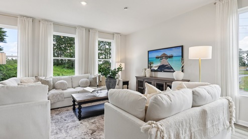 Regent main level living area with large windows