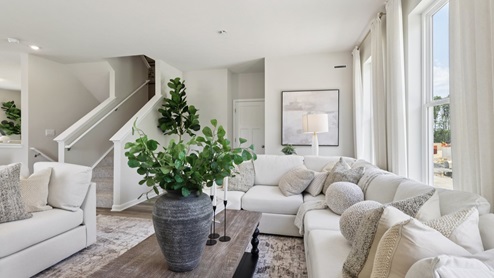 Regent main level living area with three large windows
