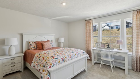 second bedroom with large windows