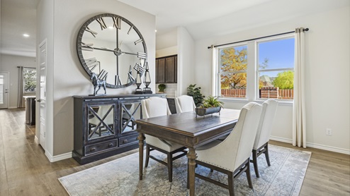 Dining room with windoes and dining room decor