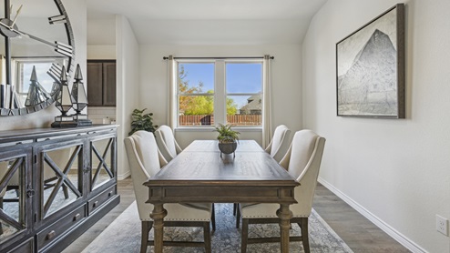Dining room with windoes and dining room decor