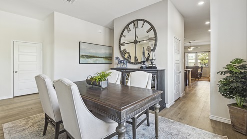 Dining room with windoes and dining room decor