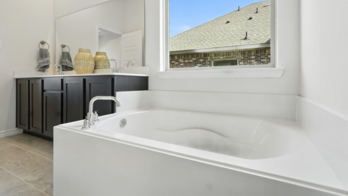 5048 Blazer Way at Fireside by the Lake in Garland, TX bathtub in the primary bathroom